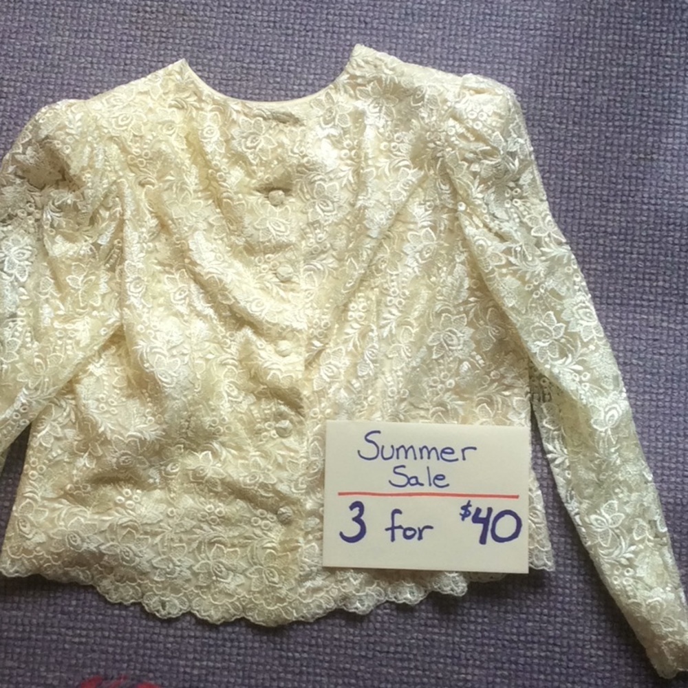 Vintage. Long sleeve cream lace jacket
